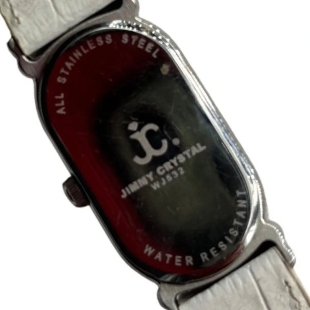 Jimmy Crystal Womens Oval Case Watch Rhinestone White Band Water Resistant WJ532